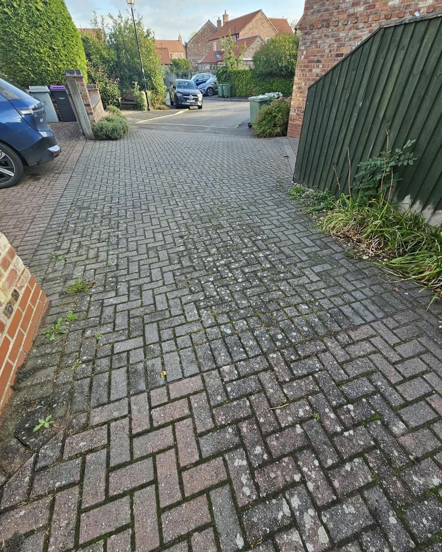 Block paving driveway before cleaning