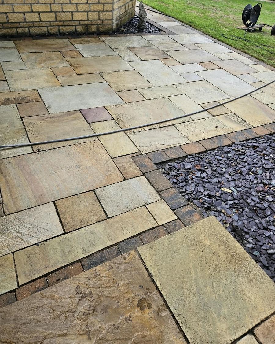 Indian sandstone patio after cleaning by Fenland Property Care