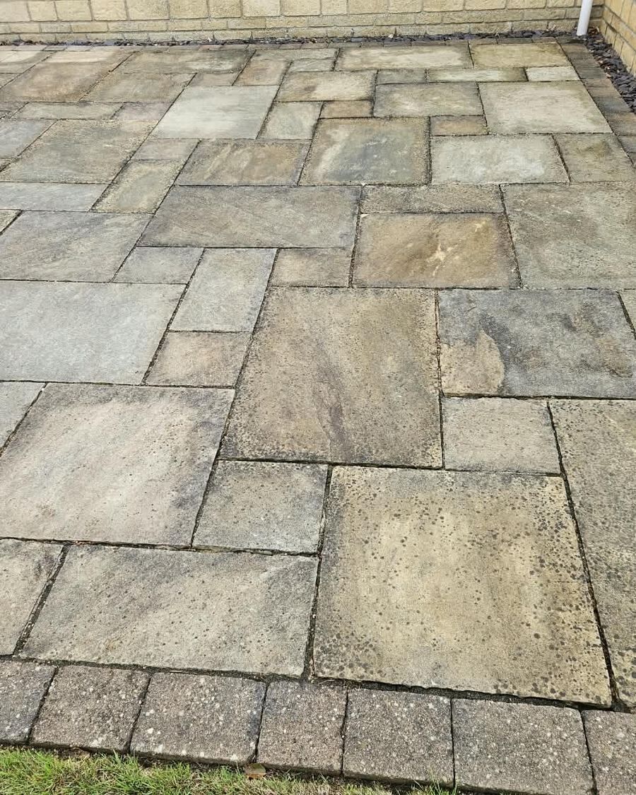 Indian sandstone patio before cleaning
